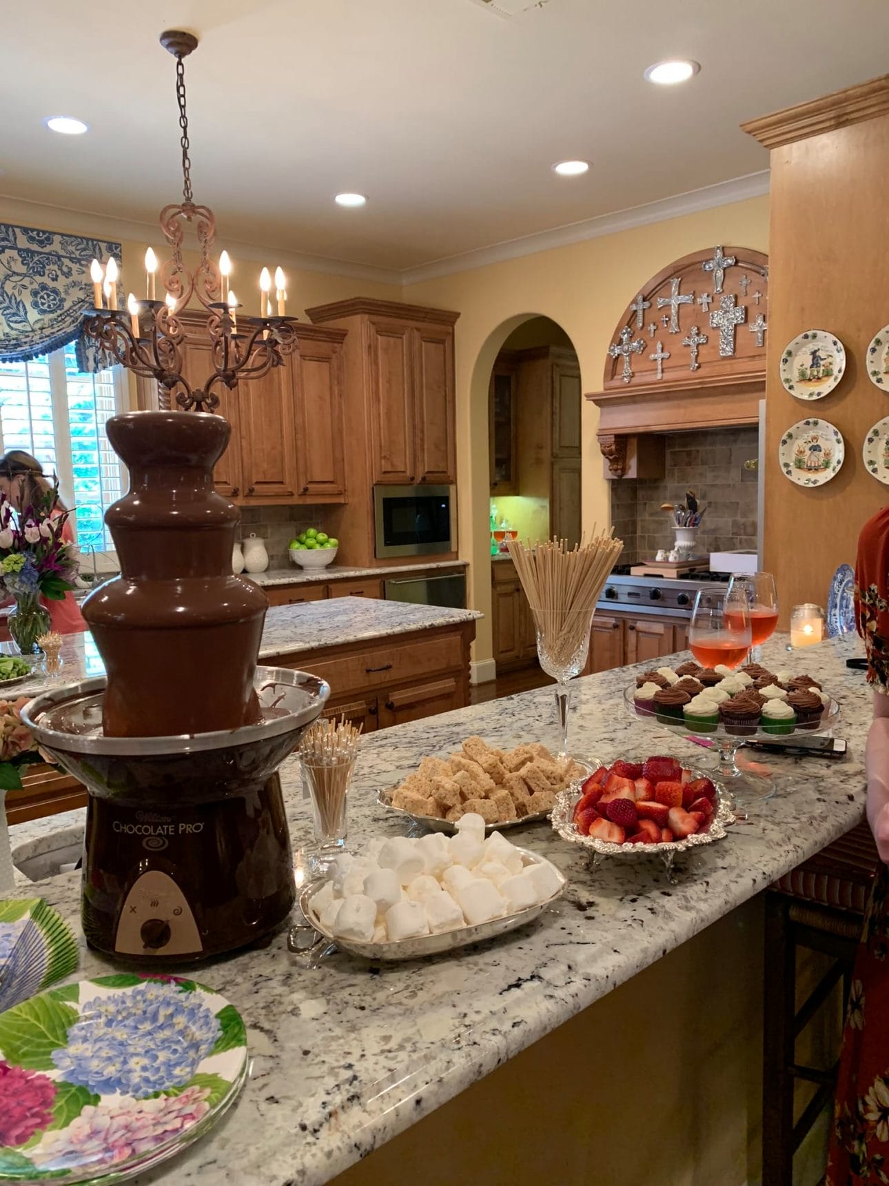 chocolate fountain and other food at a bridal shower