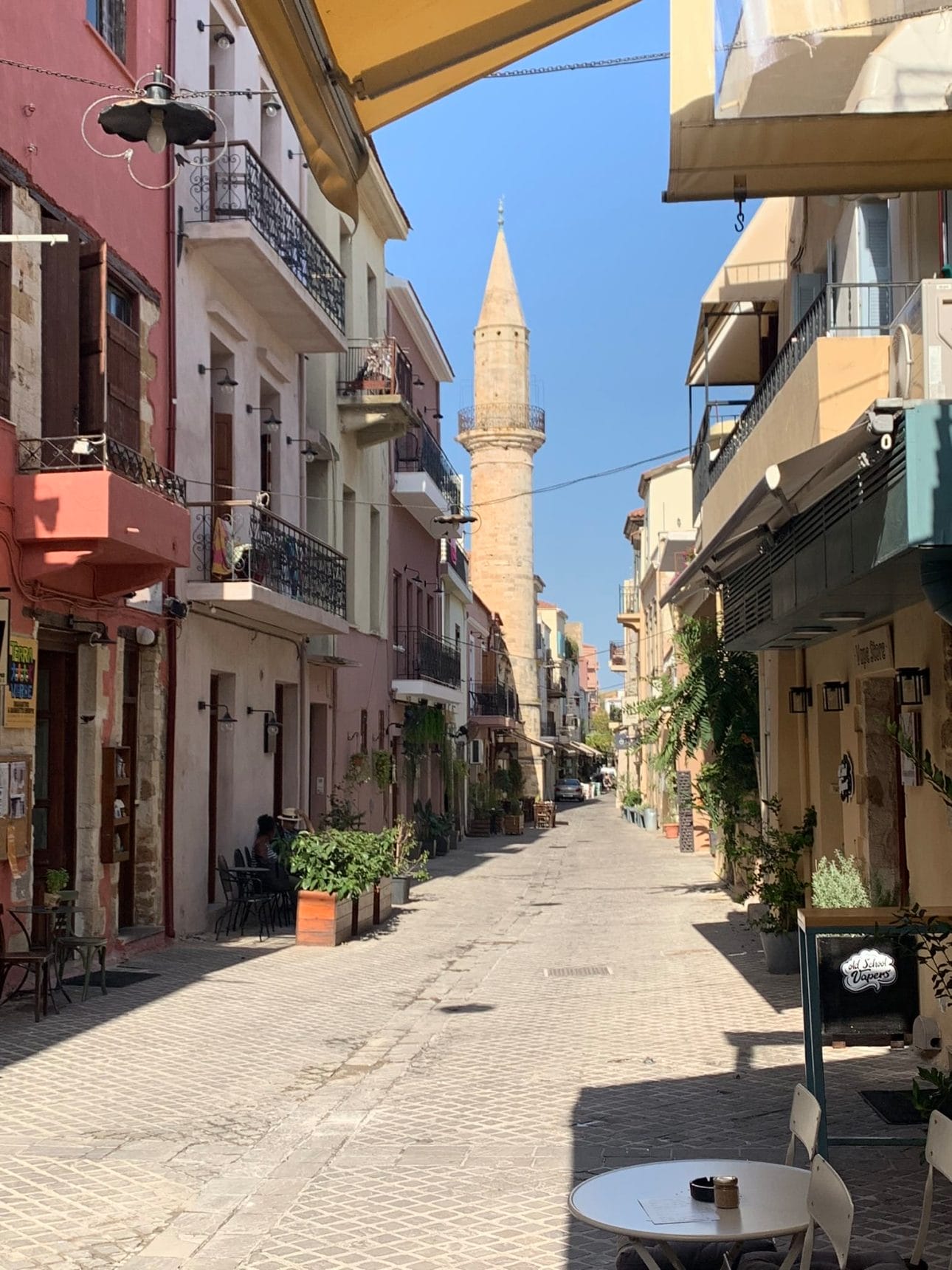 narrow street in the city of chania in crete greece