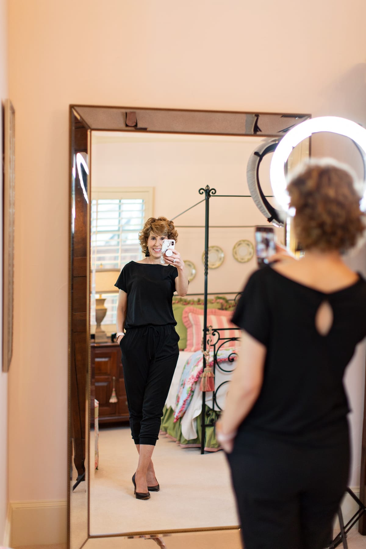 woman taking a selfie after master suite empty nester redo