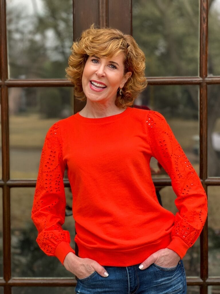 woman wearing talbots Eyelet Sleeve Crewneck Sweatshirt standing on porch