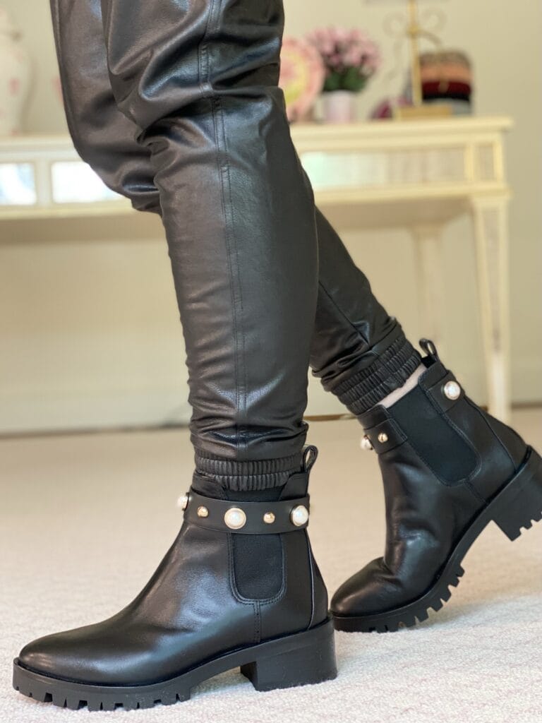 lug soled black booties with pearl trim