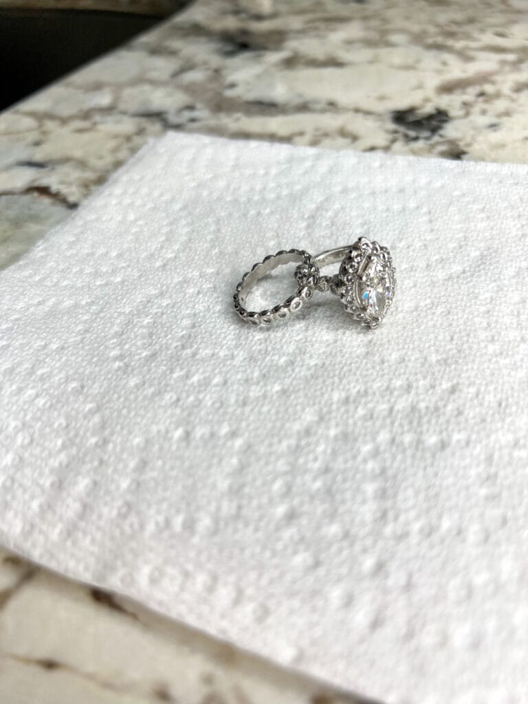 wedding ring set after being cleaned with homemade jewelry cleaner