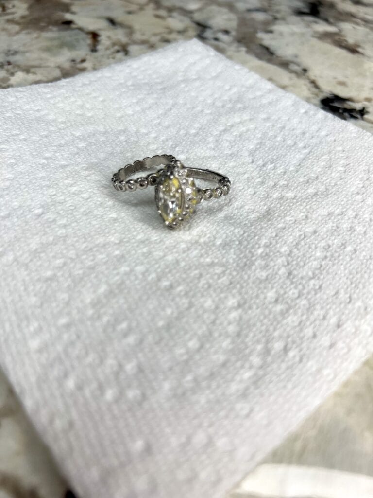 wedding ring set before being cleaned with homemade jewelry cleaner