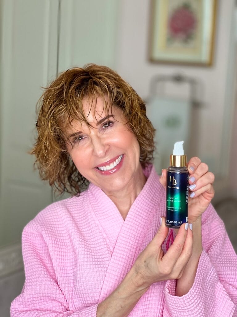 woman over 50 showing hair biology argan oil taming serum