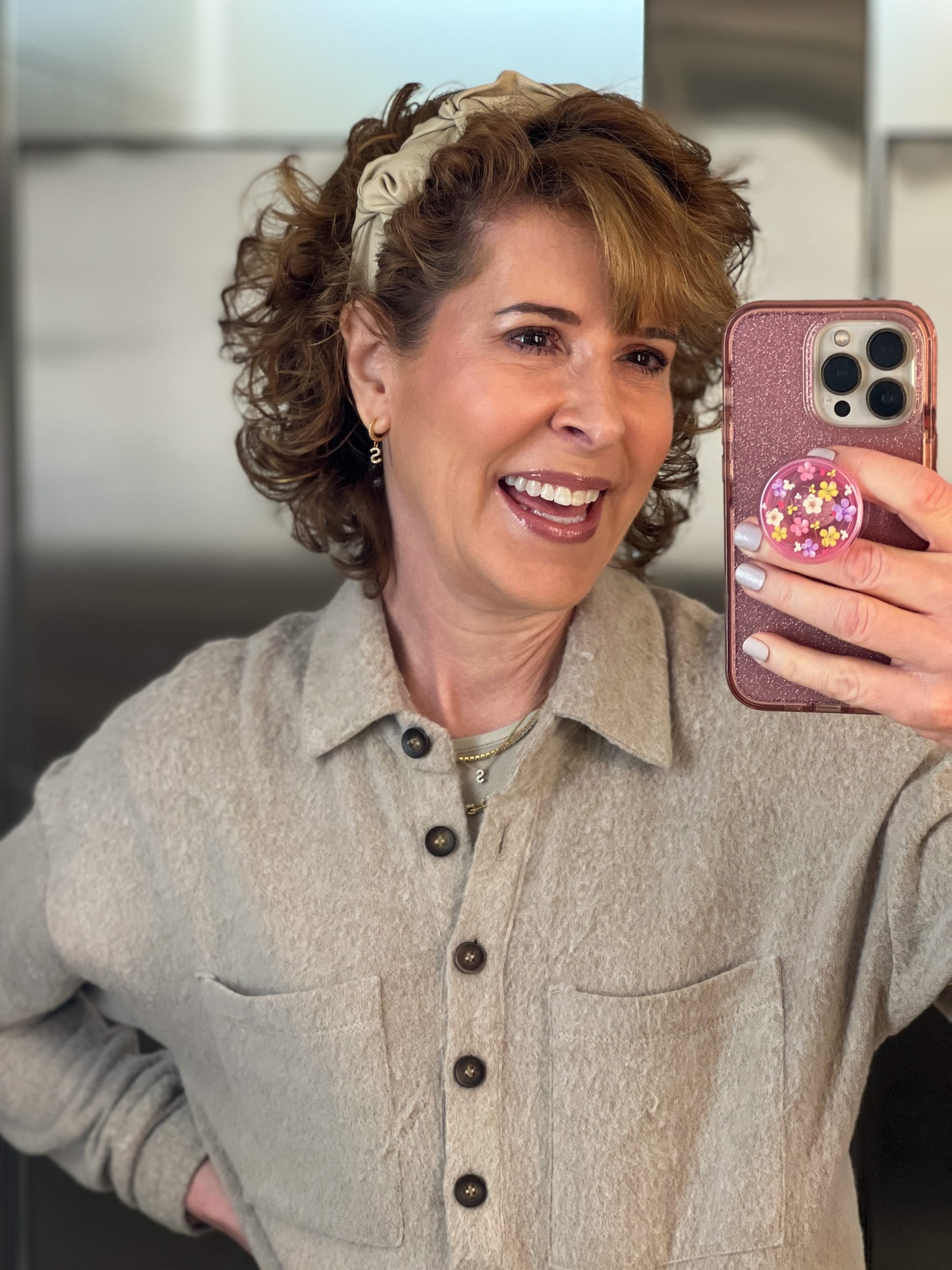 woman taking a selfie wearing nordstrom brand open edit Women's Cozy Polo Knit Top in TAN LEAD