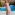 woman standing by a swimming pool wearing Caslon Floral Print Sleeveless Maxi Dress  from Nordstrom