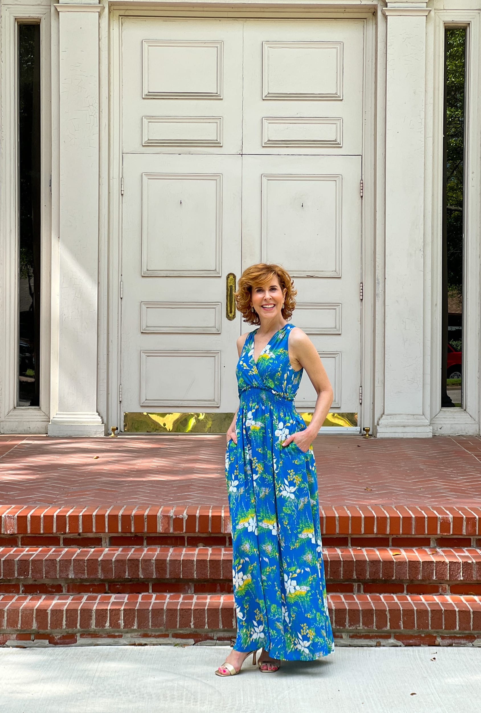 woman over 50 wearing Halogen® Wrap Front Halter Dress in front of a church wondering what to wear to a summer wedding