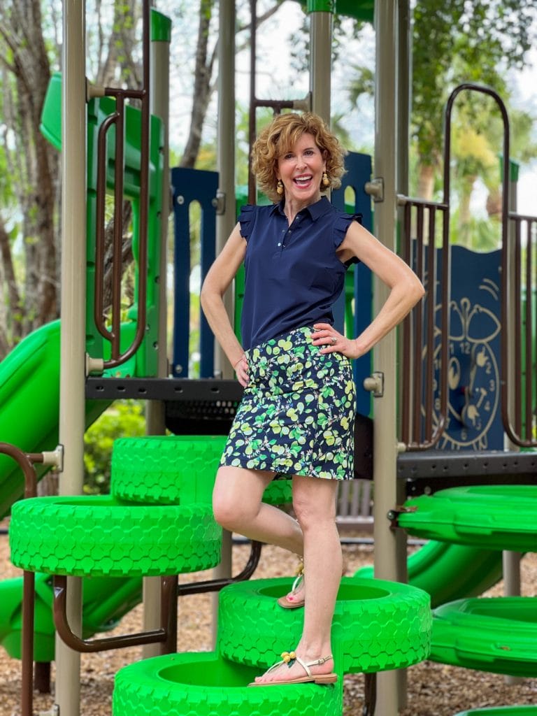 woman on a playground wearing sun protective clothing from chico's