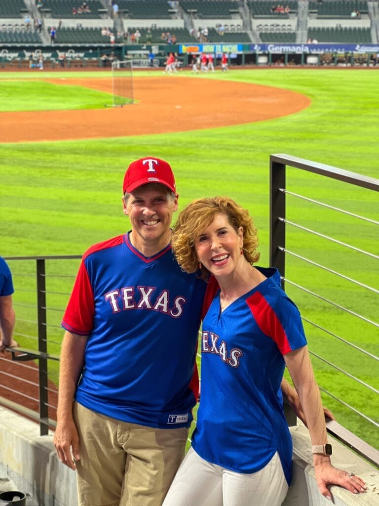 couple at a Texas Rangers baseball game