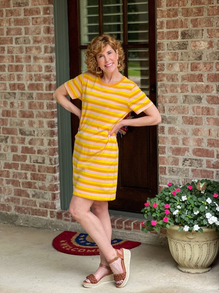 woman over 50 wearing walmart free assembly tee shirt dress