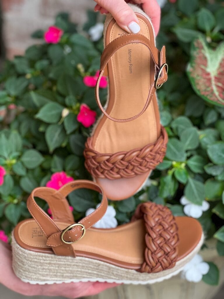 time and tru espadrille brown sandals in front of a flower pot
