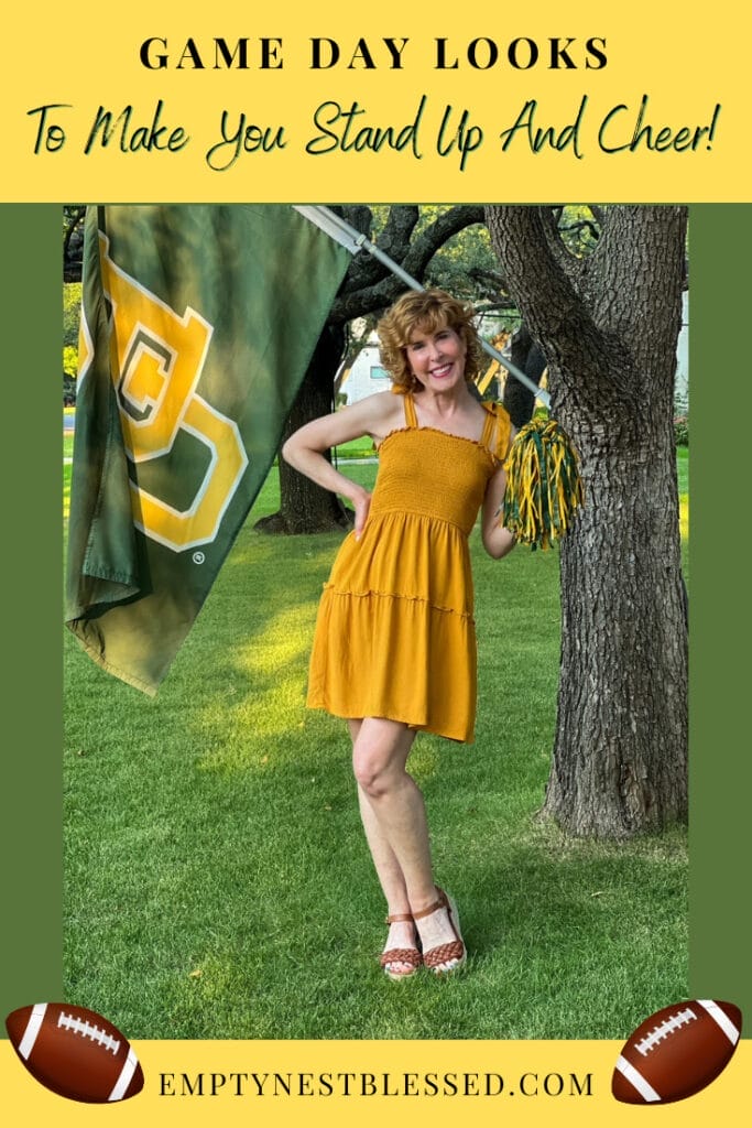woman standing by a tree with Baylor flag in a yellow sundress holding a pom pom