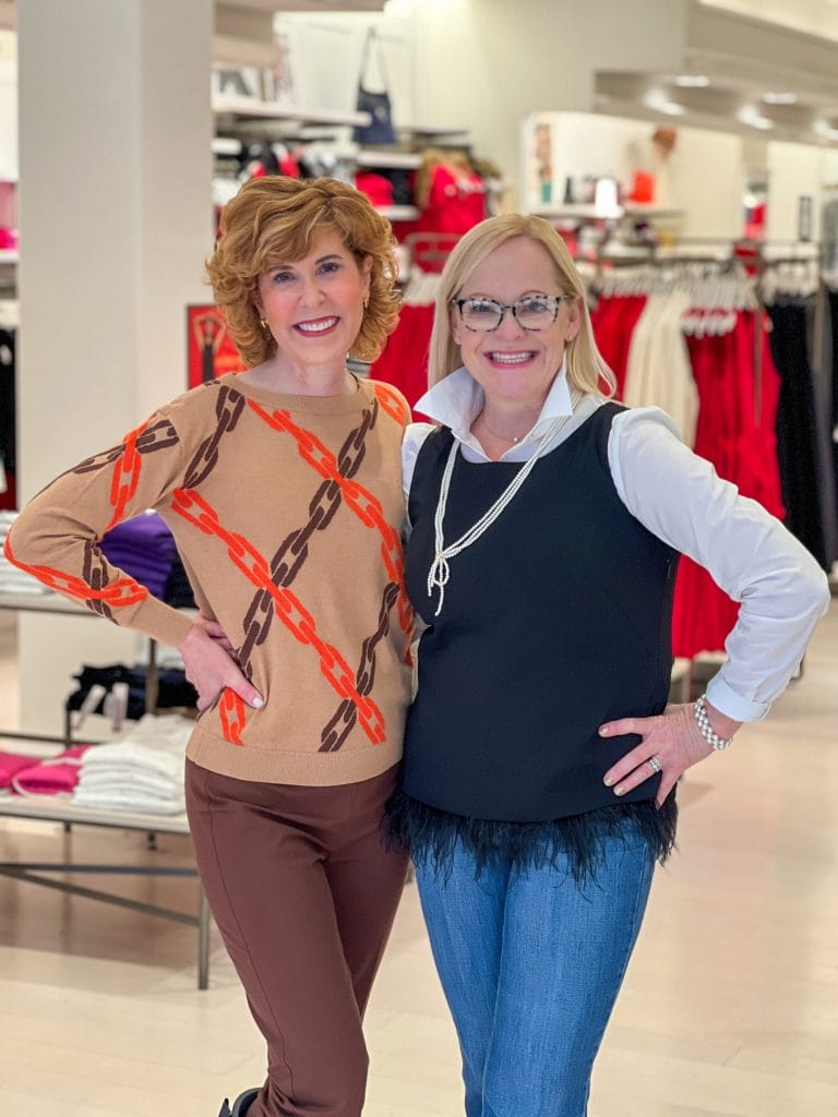 two women posing in a talbots store