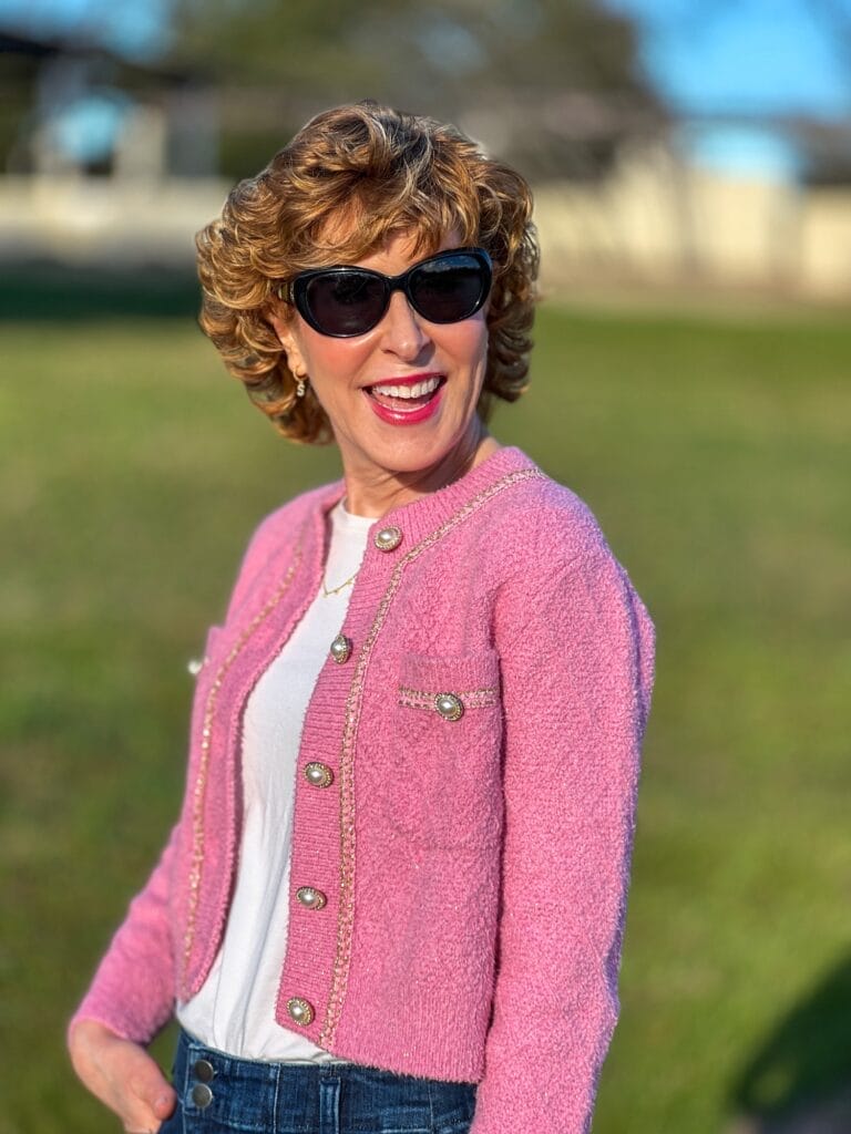 woman wearing pink amazon ladylike jacket in park