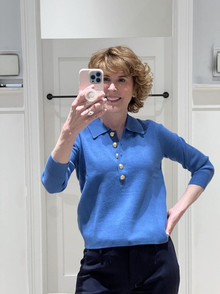 woman taking a selfie in a blue talbots johnny collar sweater