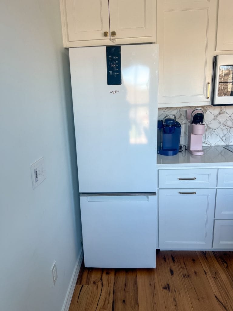 refrigerator 24" in kitchen in waco loft after remodel