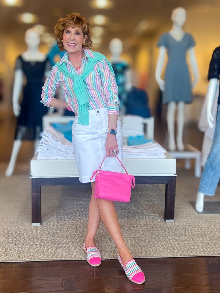 woman wearing striped button down white skirt in talbots store