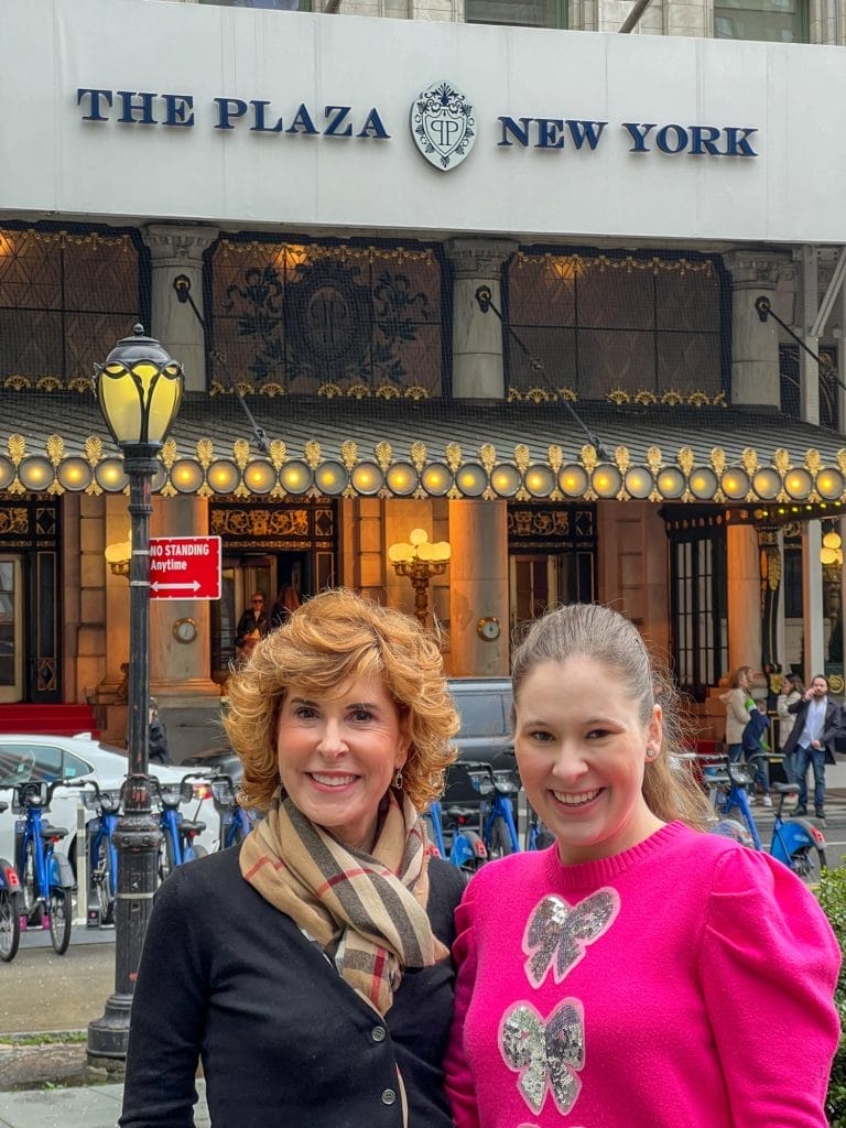 mother daughter in front of the plaza hotel nyc