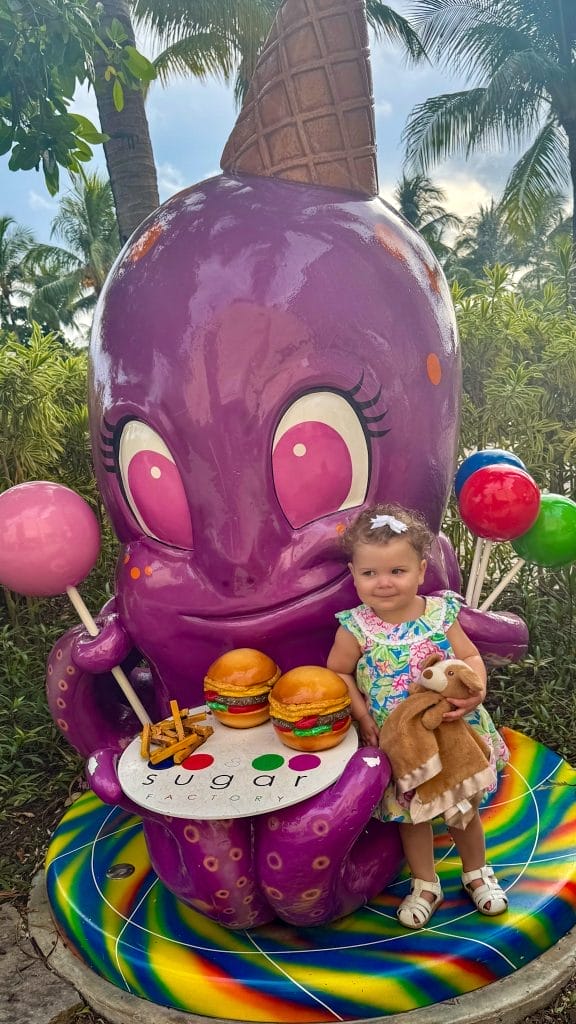 baby seated by octopus wearing lilly pulitzer Paloma Bubble Dress