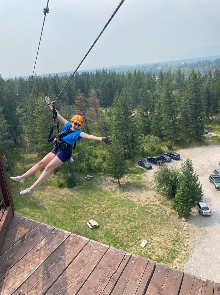 girl ziplining in montana