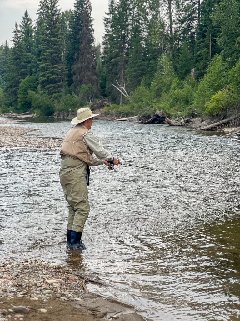 man fly fishing