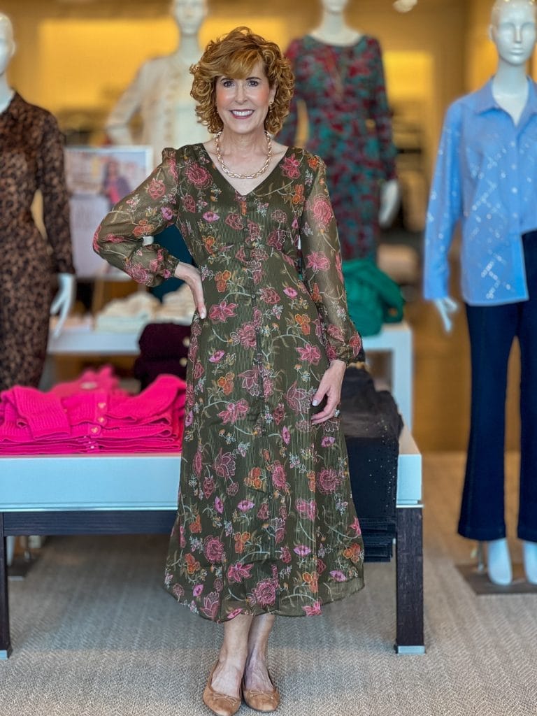 woman wearing sage green floral dress