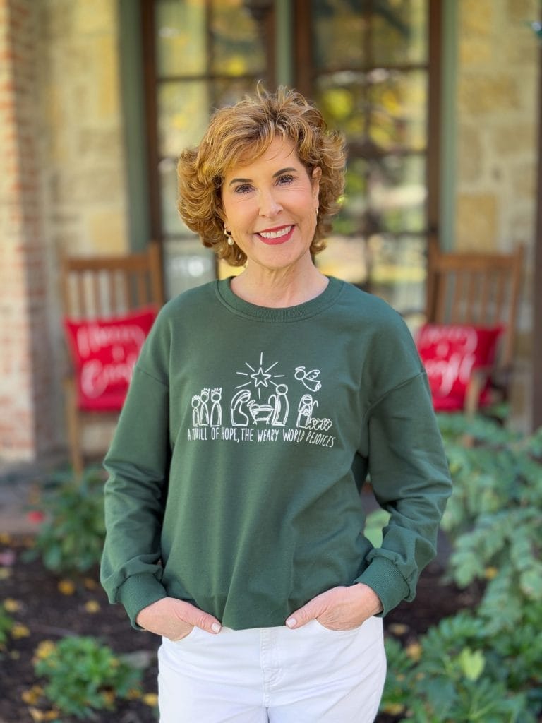 woman over 50 wearing amazon faith-based sweatshirt