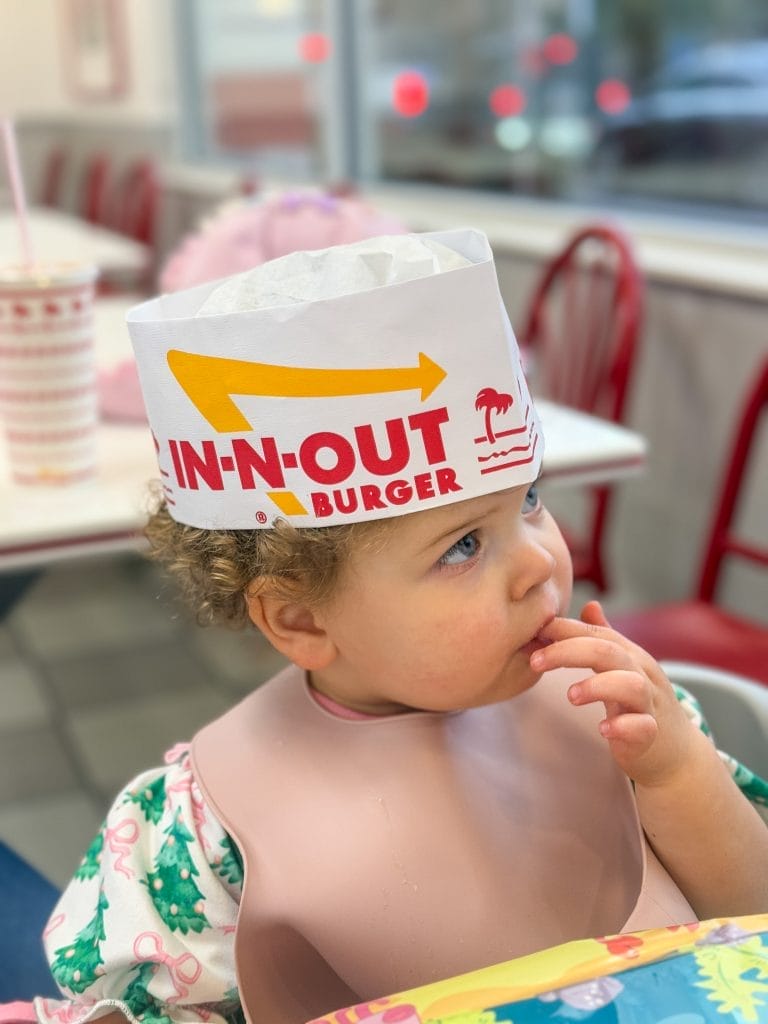 baby with in n out burger hat on